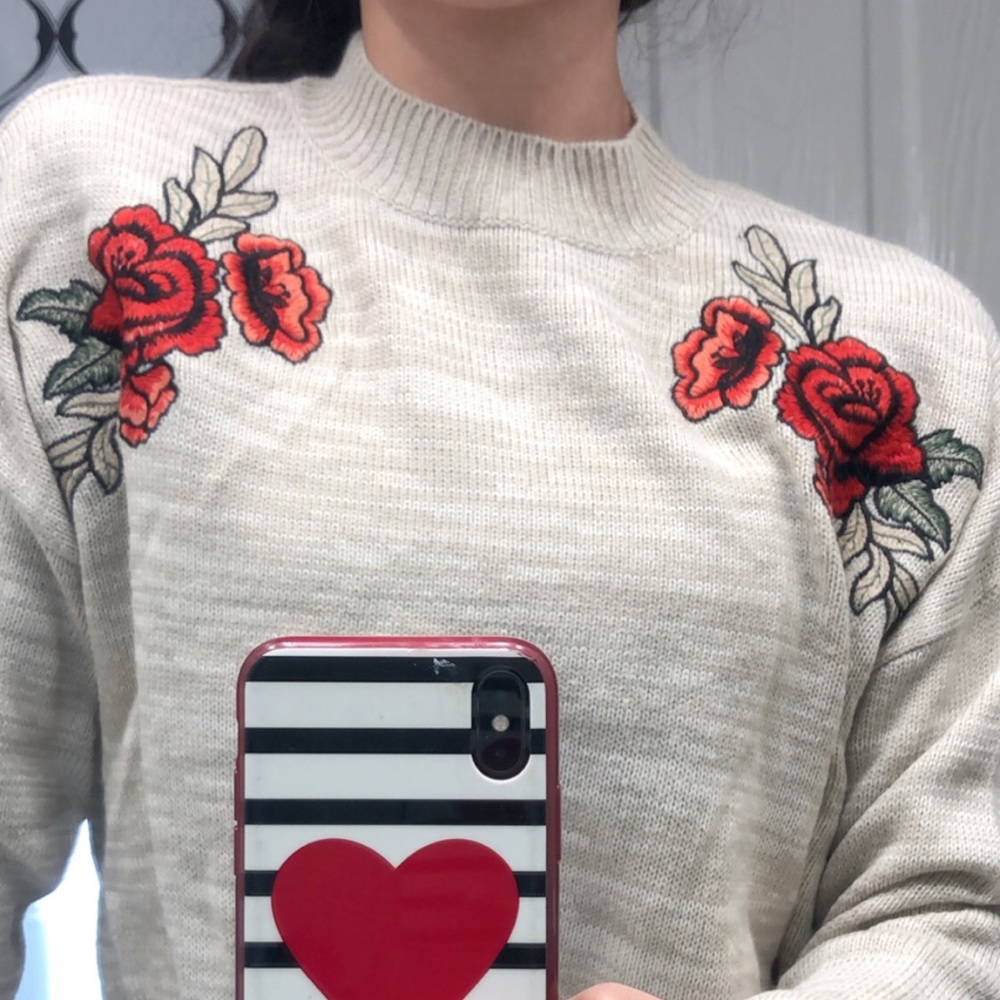 Cute sweater with roses